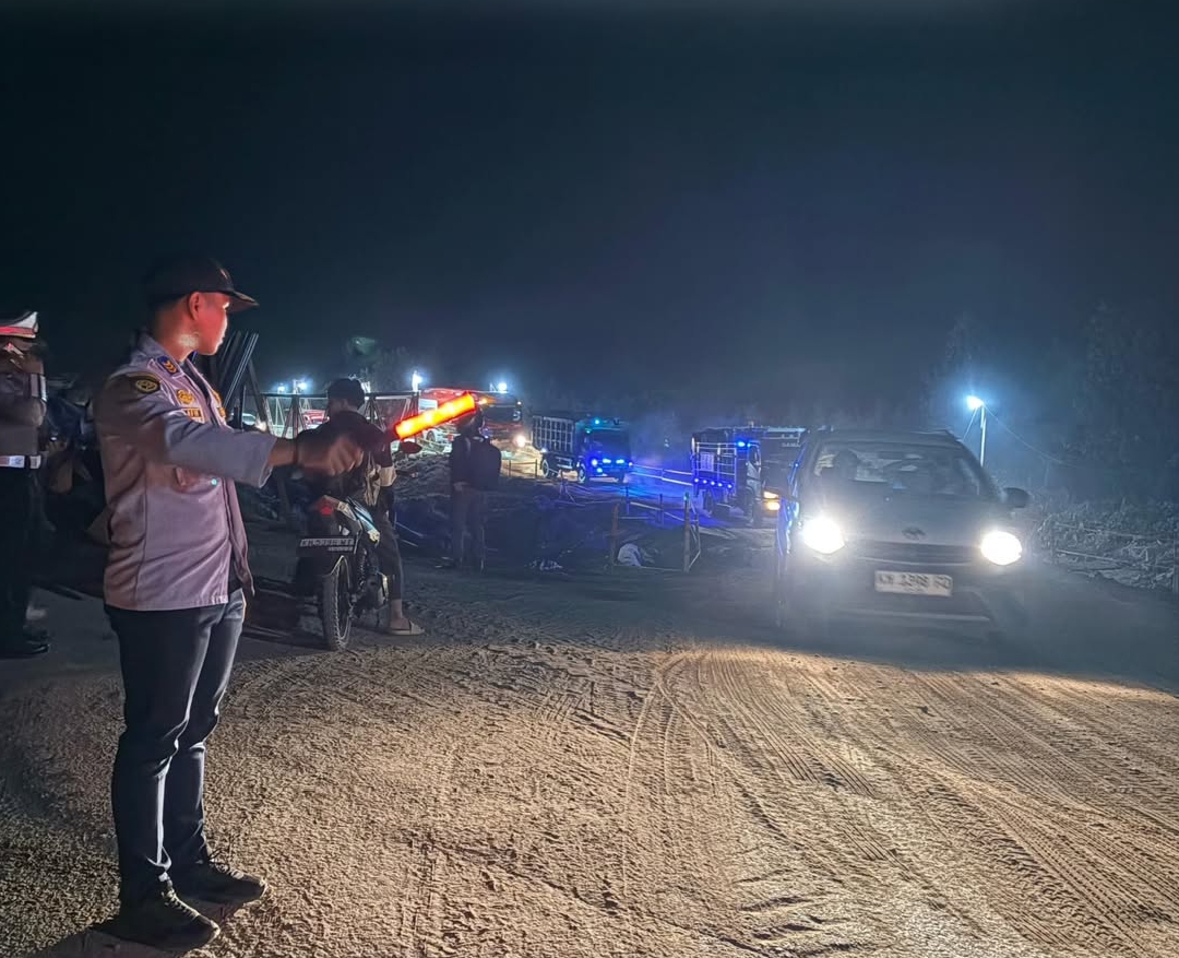 <p>Nampak arus lalu lintas di Jalan Jendral Sudirman Km 20 berjalan lancar, pada Jumat (2/8/2025) malam. (Foto: Ist) </p>